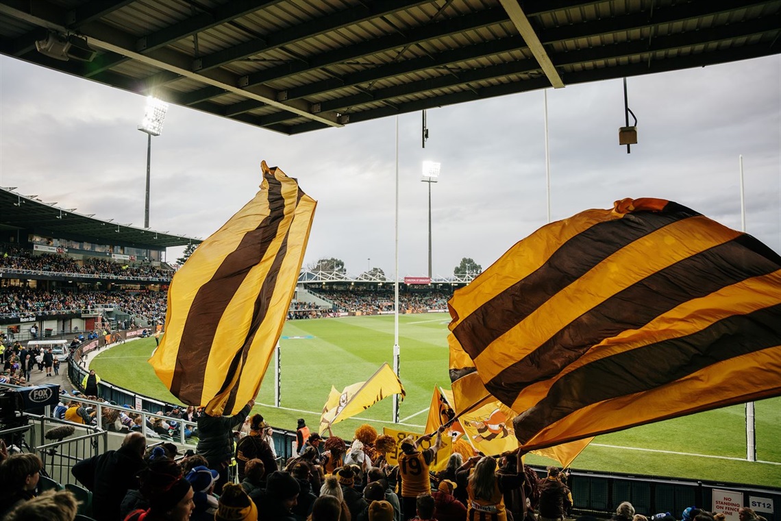 760096-waving-hawks-flags-at-utas-stadium.jpg
