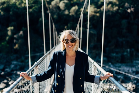 Lady smiling on the suspension bridge in the Cataract Gorge, Launceston