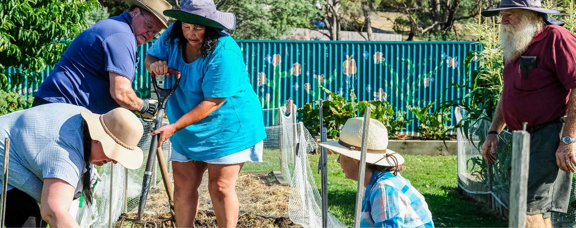 Community members working on a garden in the Northern Suburbs of Launceston