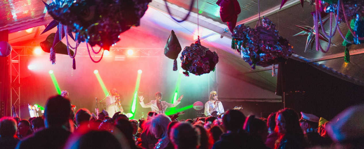 Band playing infront of crowd at a local event