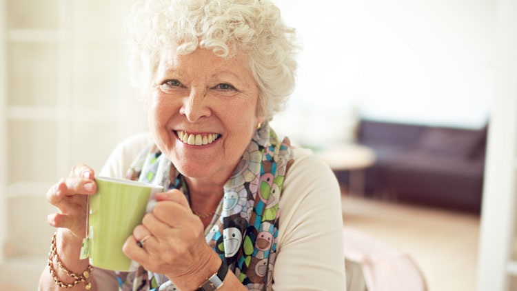 Senior woman with cup of tea